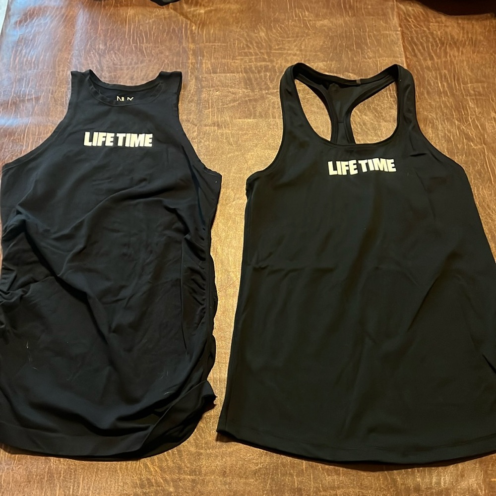 Set of two Lifetime Fitness Instructor tank tops. These are both a size small.